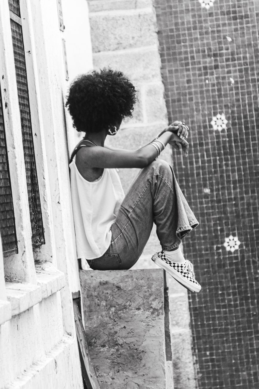 contemplative moment on urban rooftop